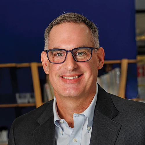 Headshot of Greg Adkins